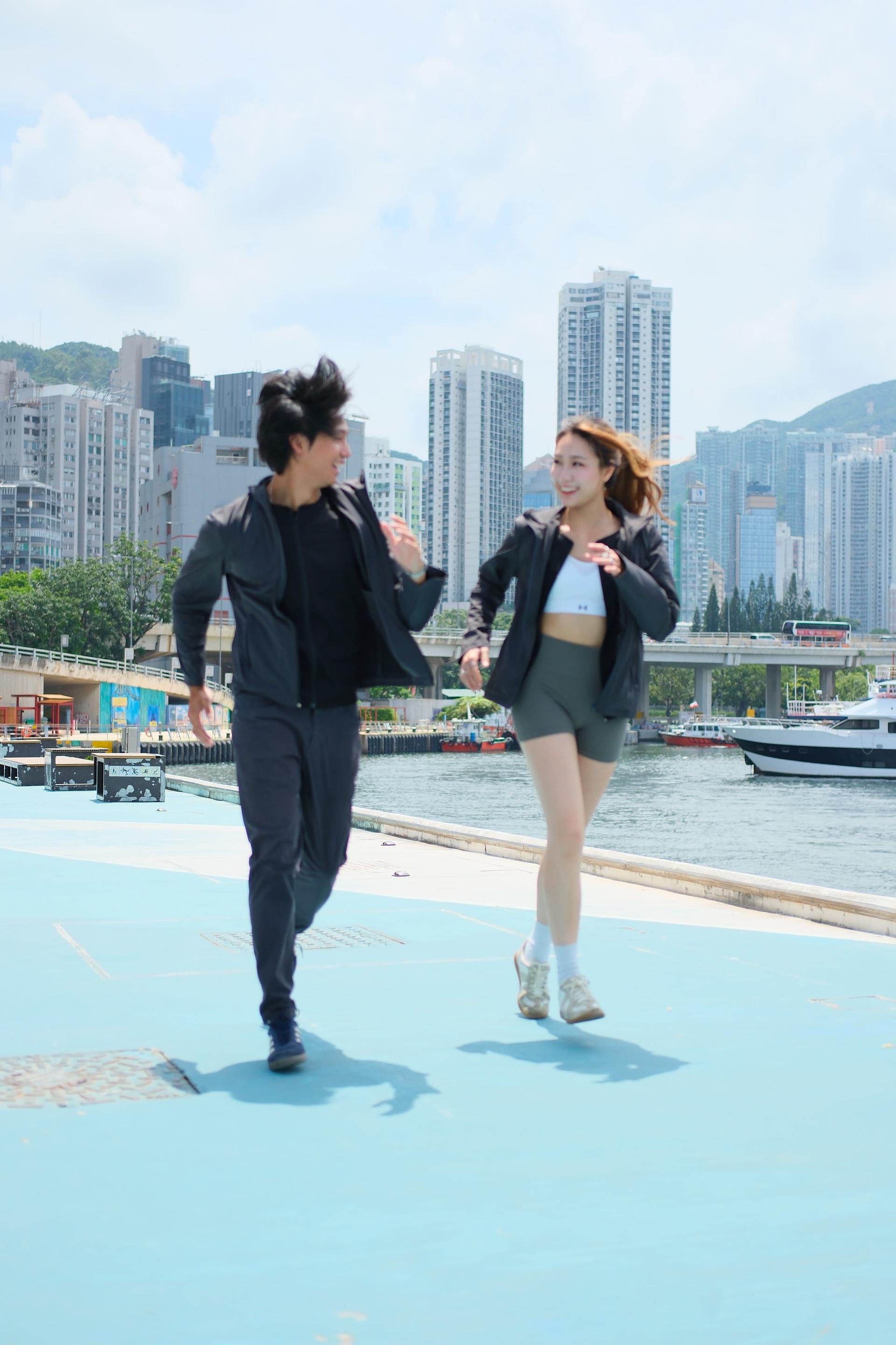 Jeremy smiling while wearing the Tactus jacket in the city