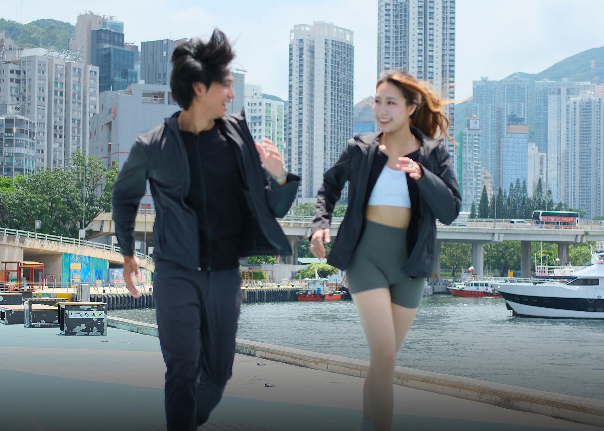 Jeremy and a woman running wearing Tactus Vibewear